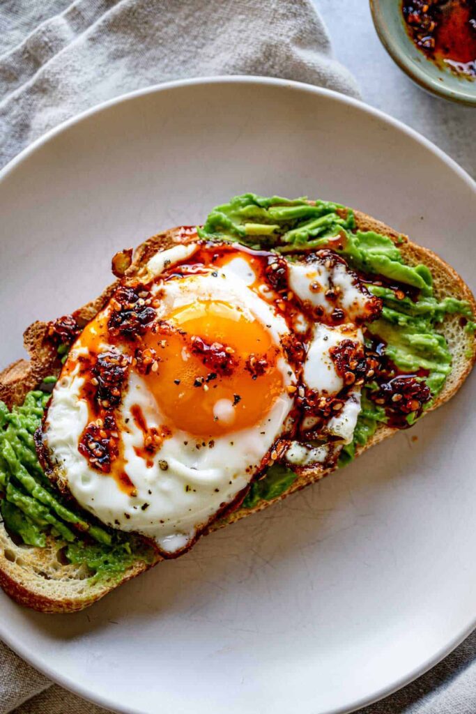 fried egg avocado toast with chili crunch